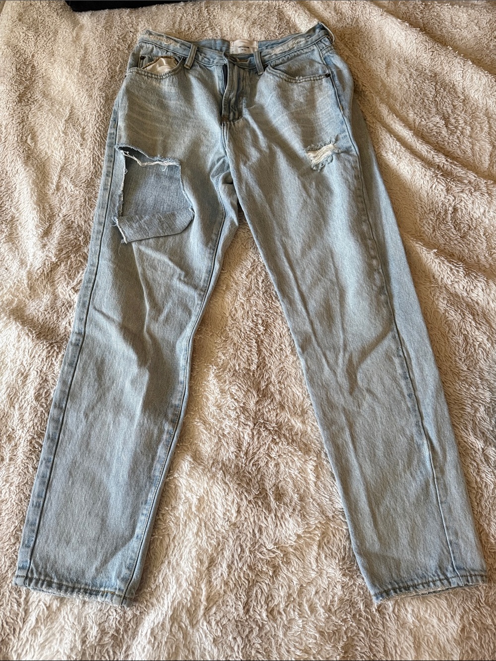 Light Blue Straight Leg Jeans with Distressed Patch Detail